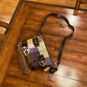 Coach handbag approx. 10” by 10 inches.  Brown with patchwork style.